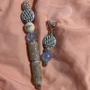 Rhinestone pen & matching phone charm.